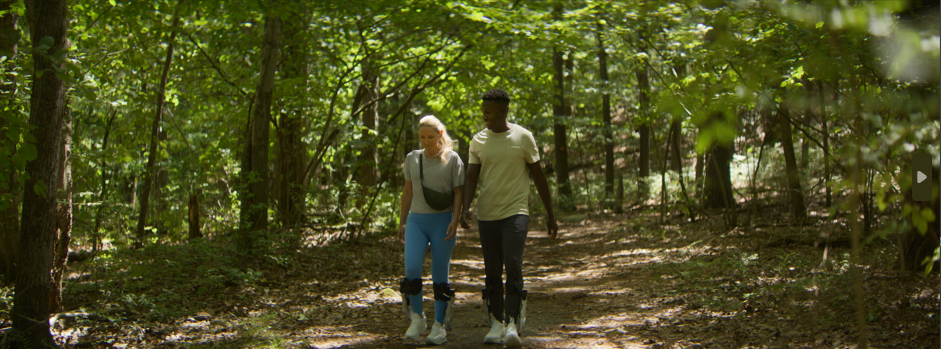 A couple enjoying a long woodland walk